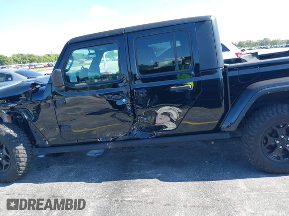 2021 Jeep Gladiator Willys with VIN 1C6HJTAGXML613431, listed as a IAAI auction lot 42180502 with 64,572 mi miles and . Bid and sale history available at DreamBid. Image 17.