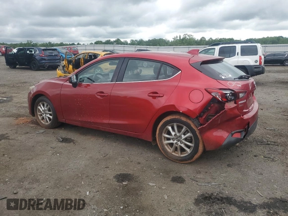 2014 Mazda 3 i Grand Touring z VIN JM1BM1M7XE1101669, wystawiony jako Copart lot #56504335 z przebiegiem 94 832 mil mil oraz Szkoda całkowita • Salvage title. Historia ofert i sprzedaży dostępna na DreamBid. Obrazek 2.