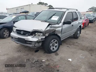 2001 Honda Passport LX z VIN 4S6CK58W014401073, wystawiony jako IAAI lot #41380551 z przebiegiem 259 878 mil mil oraz . Historia ofert i sprzedaży dostępna na DreamBid. Obrazek 17.