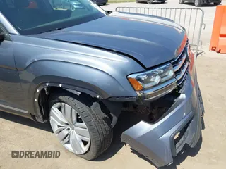 2019 Volkswagen Atlas SEL z VIN 1V2ER2CA5KC555568, wystawiony jako IAAI lot #42050516 z przebiegiem 71 599 mil mil oraz . Historia ofert i sprzedaży dostępna na DreamBid. Obrazek 6.