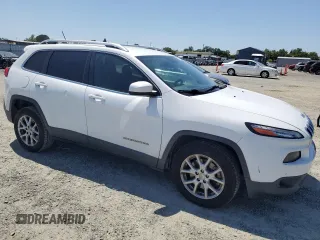 2014 Jeep Cherokee Latitude with VIN 1C4PJLCS1EW322189, listed as a Copart auction lot 55759735 with 150,329 mi miles and Clean Title. Bid and sale history available at carsss.com. Image 4.