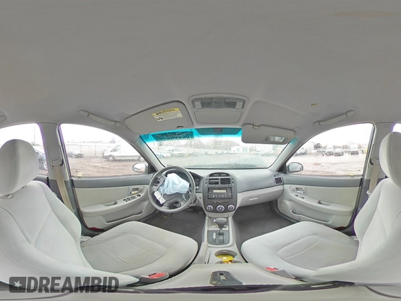 2009 Kia Spectra EX with VIN KNAFE222495648220, listed as a Copart auction lot 52886915 with 146,417 mi miles and Salvage title. Bid and sale history available at DreamBid. Image 13.