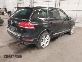 2011 Volkswagen Touareg Sport с VIN WVGFK9BP2BD001256, выставлен на аукционе IAAI как лот 41503097 с пробегом 201 301 миль миль и . История ставок и продаж доступна на DreamBid. Изображение 4.