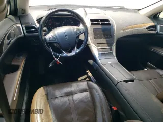 2016 Lincoln MKZ z VIN 3LN6L2GK0GR615898, wystawiony jako Copart lot #62814285 z przebiegiem 231 270 mil mil oraz Szkoda całkowita • Salvage title. Historia ofert i sprzedaży dostępna na DreamBid. Obrazek 8.