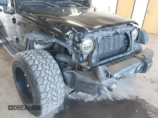 2012 Jeep Wrangler Unlimited Sport with VIN 1C4BJWDG8CL246829, listed as a IAAI auction lot 41816197 with 198,502 mi miles. Bid and sale history available at carsss.com. Image 6.