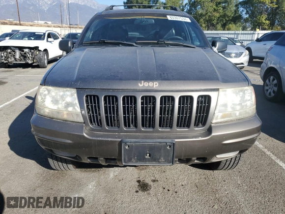 1999 Jeep Grand Cherokee Limited with VIN 1J4G268SXXC759016, listed as a Copart auction lot 80307534 with 215,870 mi miles and Salvage title. Bid and sale history available at DreamBid. Image 5.