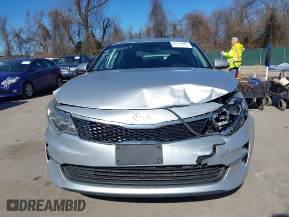 2016 Kia Optima LX with VIN 5XXGT4L37GG084538, listed as a IAAI auction lot 41784807 with 128,928 mi miles. Bid and sale history available at carsss.com. Image 12.
