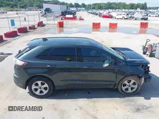 2015 Ford Edge SE z VIN 2FMTK3G9XFBC11805, wystawiony jako IAAI lot #42548330 z przebiegiem 198 370 mil mil oraz . Historia ofert i sprzedaży dostępna na DreamBid. Obrazek 14.