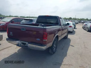 1997 Ford F-150 z VIN 1FTDX17W1VNB67040, wystawiony jako IAAI lot #41940240 z przebiegiem 99 816 mil mil oraz . Historia ofert i sprzedaży dostępna na DreamBid. Obrazek 4.