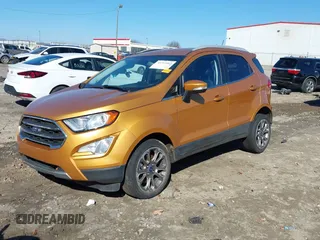 2021 Ford EcoSport Titanium z VIN MAJ3S2KE0MC449135, wystawiony jako IAAI lot #41345463 z przebiegiem 69 221 mil mil oraz . Historia ofert i sprzedaży dostępna na DreamBid. Obrazek 2.