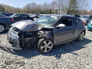 2014 Hyundai Veloster z VIN KMHTC6AD8EU185130, wystawiony jako Copart lot #53966035 z przebiegiem Nie podano mil oraz Szkoda całkowita • Salvage title. Historia ofert i sprzedaży dostępna na DreamBid. Obrazek 1.