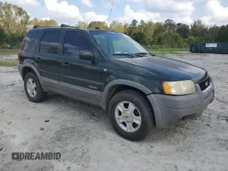 2001 Ford Escape XLT with VIN 1FMYU03161KC45236, listed as a Copart auction lot 75311644 with 271,155 mi miles and Salvage Title. Bid and sale history available at carsss.com. Image 4.