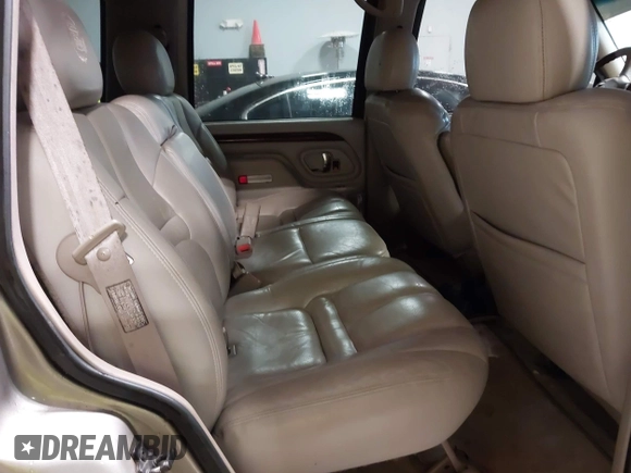 1999 Cadillac Escalade z VIN 1GYEK13RXXR413480, wystawiony jako IAAI lot #41552688 z przebiegiem 214 501 mil mil oraz . Historia ofert i sprzedaży dostępna na DreamBid. Obrazek 8.