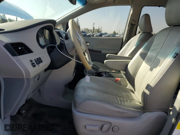 2013 Toyota Sienna XLE AAS with VIN 5TDYK3DC5DS322039, listed as a Copart auction lot 61657715 with 185,269 mi miles and Salvage title. Bid and sale history available at DreamBid. Image 7.