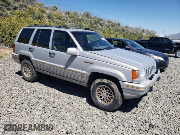1994 Jeep Grand Cherokee Limited with VIN 1J4GZ78Y0RC190766, listed as a Copart auction lot 54628055 with 217,270 mi miles and Salvage title. Bid and sale history available at DreamBid. Image 4.