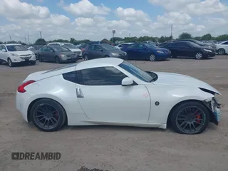 2012 Nissan 370Z z VIN JN1AZ4EH5CM564517, wystawiony jako IAAI lot #42385869 z przebiegiem 55 359 mil mil oraz . Historia ofert i sprzedaży dostępna na DreamBid. Obrazek 14.