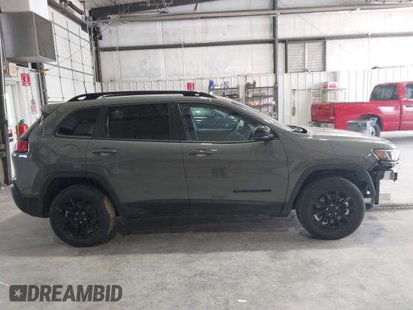 2023 Jeep Cherokee Altitude Lux with VIN 1C4PJMMBXPD115299, listed as a IAAI auction lot 41992492 with 60,232 mi miles. Bid and sale history available at carsss.com. Image 14.