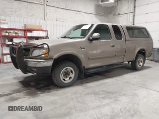 2001 Ford F-150 XL z VIN 1FTRX18W91NB49304, wystawiony jako IAAI lot #42316935 z przebiegiem 258 410 mil mil oraz . Historia ofert i sprzedaży dostępna na DreamBid. Obrazek 17.