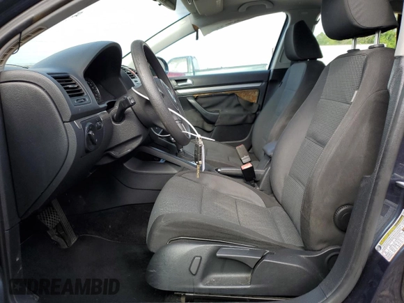 2010 Volkswagen Jetta S with VIN 3VWJX7AJ1AM026800, listed as a Copart auction lot 55755185 with 126,551 mi miles and Salvage title. Bid and sale history available at DreamBid. Image 7.