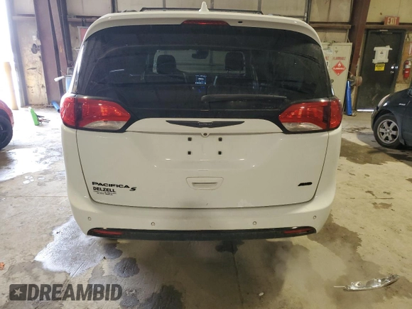 2020 Chrysler Pacifica Launch Edition z VIN 2C4RC3BG1LR263912, wystawiony jako Copart lot #81785354 z przebiegiem 124 071 mil mil oraz Szkody całkowita. Historia ofert i sprzedaży dostępna na DreamBid. Obrazek 6.