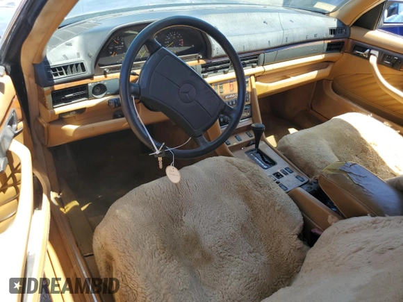 1989 Mercedes-Benz 560 с VIN WDBCA45E0KA478906, выставлен на аукционе Copart как лот 61273615 с пробегом 112 894 миль миль и Чистый • Clean title. История ставок и продаж доступна на DreamBid. Изображение 8.