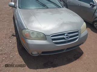 2002 Nissan Maxima GXE z VIN JN1DA31D02T202083, wystawiony jako IAAI lot #42496695 z przebiegiem 156 491 mil mil oraz . Historia ofert i sprzedaży dostępna na DreamBid. Obrazek 6.