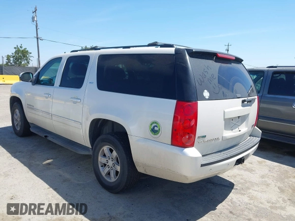 2012 GMC Yukon XL SLT z VIN 1GKS2LE74CR100438, wystawiony jako IAAI lot #42319226 z przebiegiem 172 628 mil mil oraz . Historia ofert i sprzedaży dostępna na DreamBid. Obrazek 3.