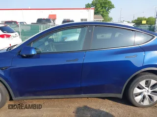 2023 Tesla Model Y Long Range with VIN 7SAYGDEE0PF671726, listed as a IAAI auction lot 42393616 with Not provided miles and . Bid and sale history available at DreamBid. Image 14.