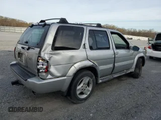 2003 Infiniti QX4 Luxury z VIN JNRDR09Y33W301556, wystawiony jako Copart lot #47765914 z przebiegiem Nie podano mil oraz Szkody całkowita. Historia ofert i sprzedaży dostępna na DreamBid. Obrazek 3.