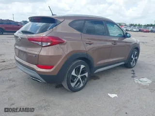 2017 Hyundai Tucson Value with VIN KM8J33A27HU430198, listed as a IAAI auction lot 42104369 with 163,929 mi miles. Bid and sale history available at carsss.com. Image 4.
