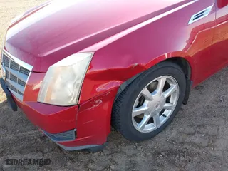2009 Cadillac CTS AWD w/1SB with VIN 1G6DS57V390159184, listed as a IAAI auction lot 41323423 with 158,980 mi miles. Bid and sale history available at carsss.com. Image 6.