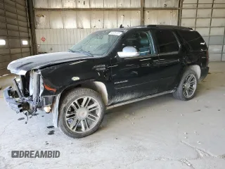 2012 Cadillac Escalade Premium z VIN 1GYS4CEF9CR299607, wystawiony jako Copart lot #50226185 z przebiegiem 206 883 mil mil oraz Szkody całkowita. Historia ofert i sprzedaży dostępna na DreamBid. Obrazek 1.