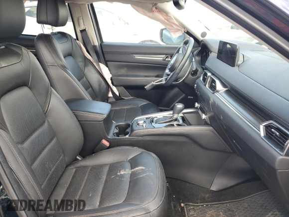 2021 Mazda CX-5 Grand Touring with VIN JM3KFBDM0M0500561, listed as a Copart auction lot 58214665 with 49,543 mi miles and Salvage title. Bid and sale history available at DreamBid. Image 7.