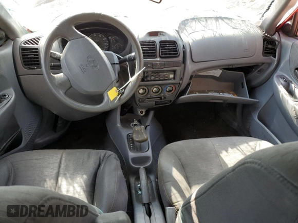 2005 Hyundai Accent GLS with VIN KMHCG45CX5U618473, listed as a Copart auction lot 76752994 with 0 mi miles and Salvage Title. Bid and sale history available at carsss.com. Image 8.
