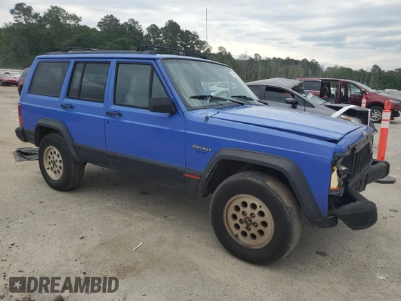 1996 Jeep Cherokee Sport z VIN 1J4FT68S8TL128381, wystawiony jako Copart lot #57496175 z przebiegiem 221 330 mil mil oraz Szkoda całkowita • Salvage title. Historia ofert i sprzedaży dostępna na DreamBid. Obrazek 4.