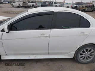 2014 Mitsubishi Lancer ES with VIN JA32U2FU4EU002366, listed as a IAAI auction lot 41942673 with 117,934 mi miles. Bid and sale history available at carsss.com. Image 14.