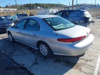 1999 Mercury Sable GS with VIN 1MEFM50U1XA612306, listed as a IAAI auction lot 41745776 with 111,311 mi miles. Bid and sale history available at carsss.com. Image 3.