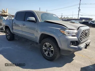 2020 Toyota Tacoma SR5 with VIN 3TMAZ5CN2LM137991, listed as a Copart auction lot 60317895 with 98,054 mi miles and Salvage title. Bid and sale history available at DreamBid. Image 4.