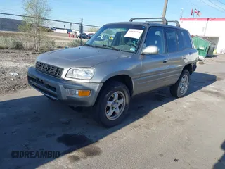1999 Toyota RAV4 with VIN JT3HP10V5X7139594, listed as a IAAI auction lot 42029970 with 199,204 mi miles and . Bid and sale history available at DreamBid. Image 2.