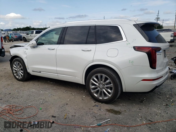 2023 Cadillac XT6 FWD Premium Luxury with VIN 1GYKPCRS5PZ120161, listed as a Copart auction lot 54614235 with 39,700 mi miles and Salvage title. Bid and sale history available at DreamBid. Image 2.