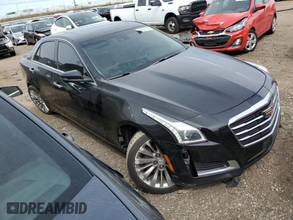 2015 Cadillac CTS Luxury AWD with VIN 1G6AX5SX6F0115950, listed as a Copart auction lot 54502195 with 118,256 mi miles and Salvage title. Bid and sale history available at DreamBid. Image 4.
