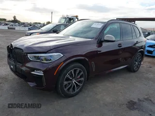 2021 BMW X5 M50i with VIN 5UXJU4C04M9G03418, listed as a IAAI auction lot 40705167 with 24,073 mi miles and . Bid and sale history available at DreamBid. Image 18.