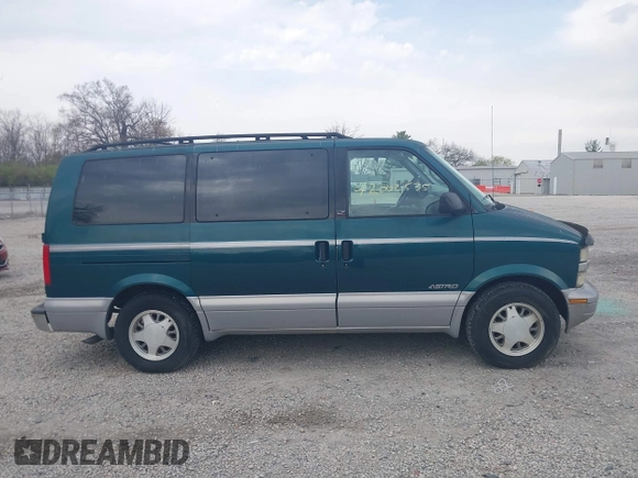 1997 Chevrolet Astro with VIN 1GNDM19W9VB205001, listed as a IAAI auction lot 42002535 with 136,734 mi miles. Bid and sale history available at carsss.com. Image 13.