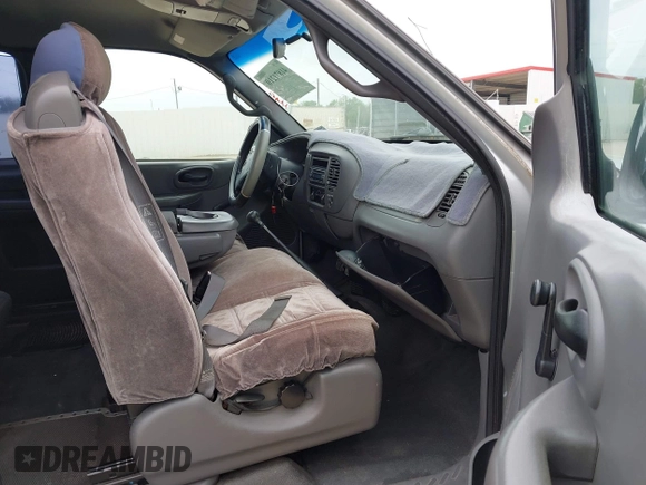 2002 Ford F-150 XL with VIN 1FTRX17282NA84011, listed as a IAAI auction lot 41871210 with 1 mi miles. Bid and sale history available at carsss.com. Image 5.