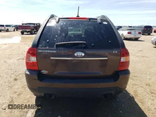 2009 Kia Sportage LX with VIN KNDJF724697568334, listed as a Copart auction lot 54056605 with 252,049 mi miles and Clean Title. Bid and sale history available at carsss.com. Image 6.