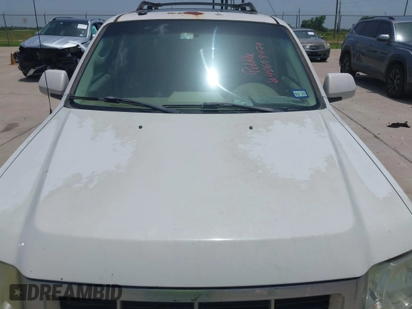 2009 Ford Escape Limited with VIN 1FMCU04G59KC67544, listed as a IAAI auction lot 42658474 with 330,335 mi miles and . Bid and sale history available at DreamBid. Image 6.