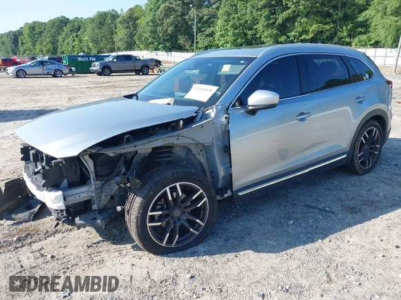 2016 Mazda CX-9 Signature with VIN JM3TCBEY7G0120023, listed as a IAAI auction lot 42431039 with 160,276 mi miles and . Bid and sale history available at DreamBid. Image 2.
