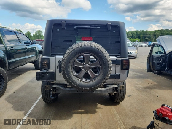 2016 Jeep Wrangler Unlimited Sahara with VIN 1C4BJWEG6GL168944, listed as a Copart auction lot 61650615 with 66,016 mi miles and Salvage title. Bid and sale history available at DreamBid. Image 6.