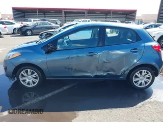 2014 Mazda 2 Sport with VIN JM1DE1KY0E0181555, listed as a IAAI auction lot 41539841 with 121,918 mi miles and . Bid and sale history available at DreamBid. Image 14.
