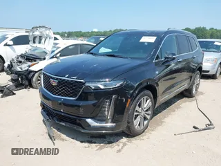 2021 Cadillac XT6 Premium Luxury with VIN 1GYKPDRS0MZ153523, listed as a IAAI auction lot 42770895 with 19,843 mi miles and . Bid and sale history available at DreamBid. Image 17.